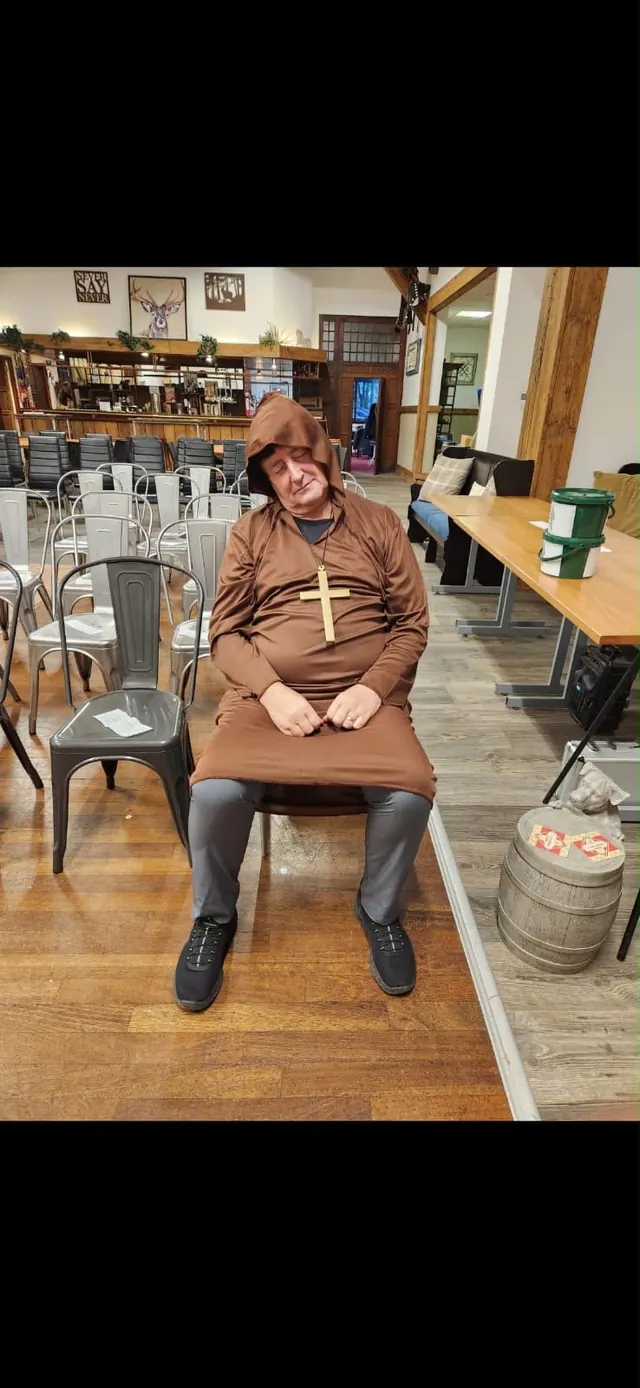 Performer seated during a Robin Hood rehearsal